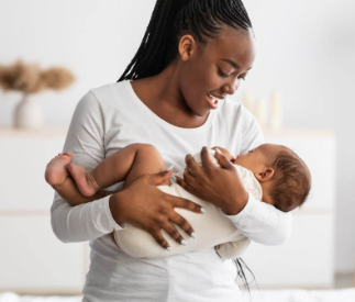 Woman Cradling Baby