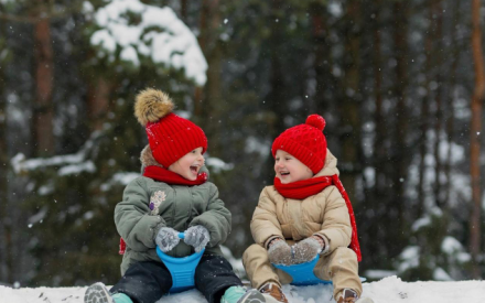 Young Children Playing in Snow